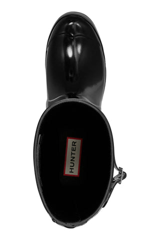 A black rubber rain boot shown from a top-down view, featuring a glossy finish and a visible Hunter brand label inside the collar.