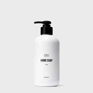 A white plastic bottle with a pump dispenser, labeled 'HAND SOAP' with the brand 'PUBLIC GOODS' below it.